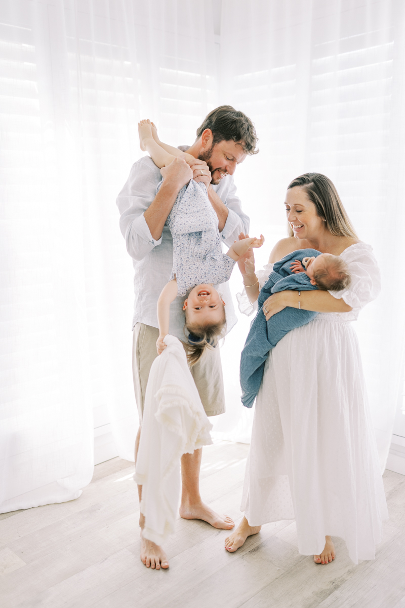 Studio newborn session with toddler